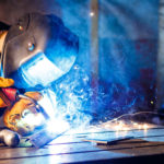 Cutting metal with plasma equipment on plant.