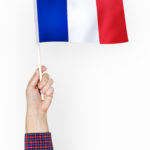 Person waving the flag of French Republic